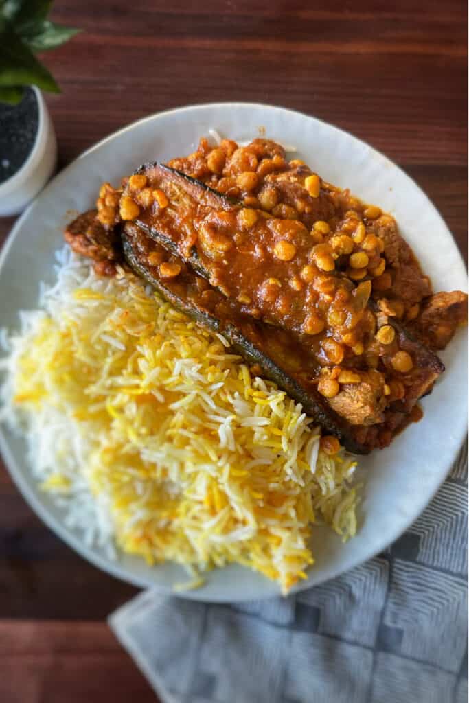 Gheimeh Kadoo Persian yellow split-pea stew with fried zucchini and rice.