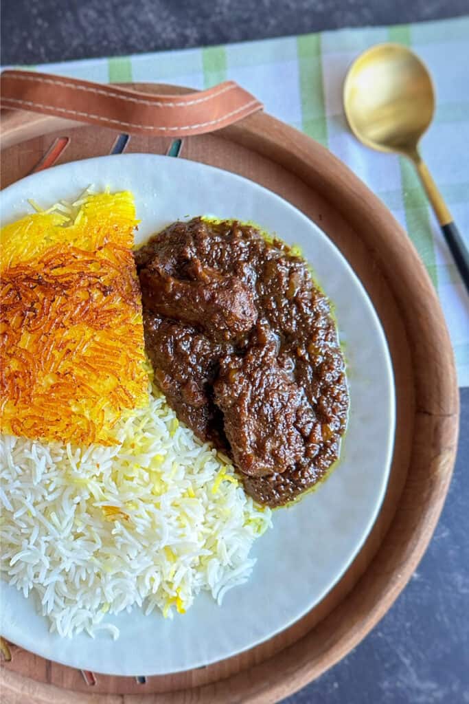 Fesenjoon Persian walnut and pomegranate stew with rice
