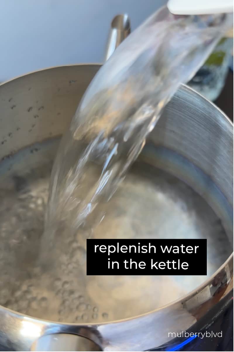 Water being added to the tea kettle