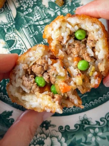 Tahdig Rice Balls with Shepherd's Pie Filling split in half so that the filling can be seen